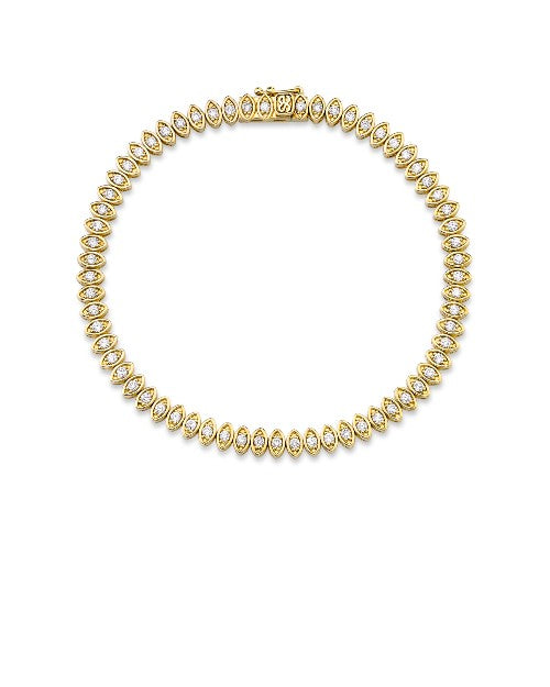Gold bracelet with diamond evil eye design for chain.