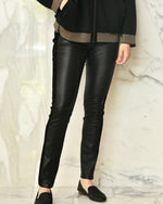 Front of Stretch Leather Pants in black.