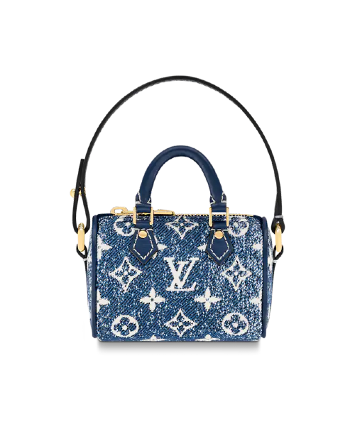 Denim blue Louis Vuitton print bag charm with gold hardware and leather handles.