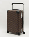 Dark brown rolling luggage with iconic Louis Vuitton pattern and silver hardware.
