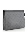 Pochette Voyage Eclipse Reverse Canvas MM in front of white background. 