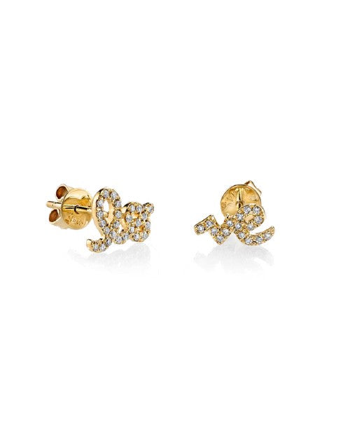 Gold stud earrings with diamonds spelling out "lo-ve" in cursive across both earrings. 