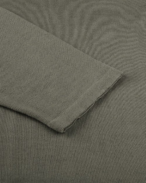 Close up of small ribbed cuffs on sleeves. 