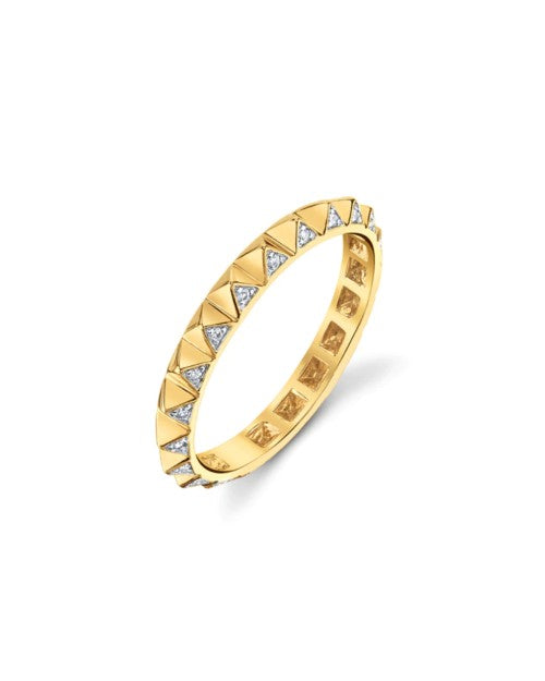 Gold and diamond ring with small pyramids around the band.