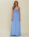 Model wearing Aura Strappy Halter Tie Front Maxi in front of white background. 
