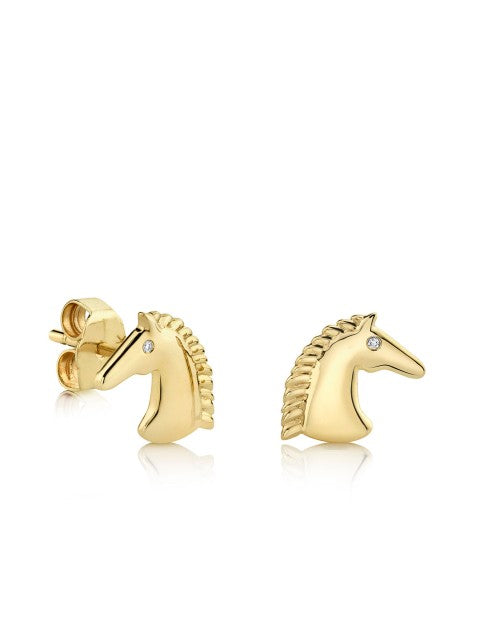 Yellow gold stud earrings with horse heads that have diamond eyes. 