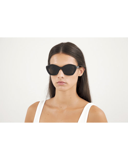 Model wearing New Wave Woman Sunglasses. 