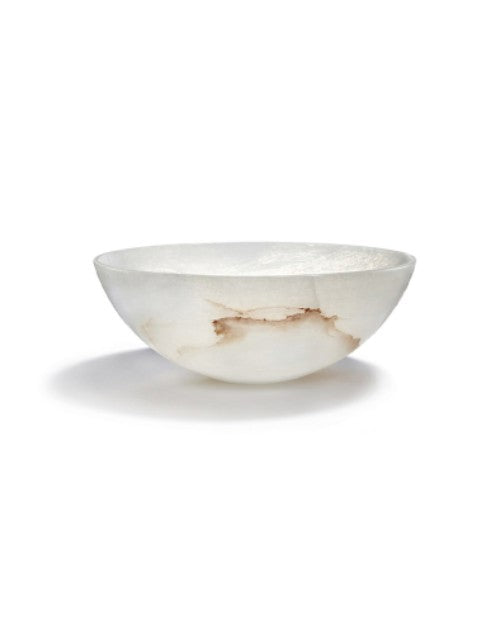 Medium-sized alabaster tondo bowl in front of white background. 