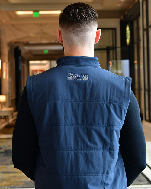 Back of Interlude Puffer Vest with Post Oak logo embroidered underneath the collar.