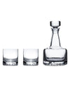 Decanter and glasses in front of all white background.