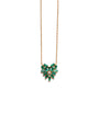 Yellow gold chain necklace with emerald and diamond heart pendant.